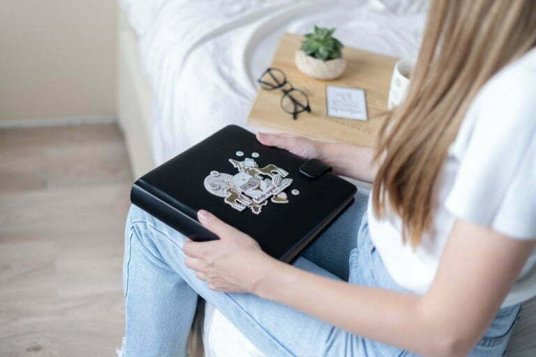 a person holding a black device