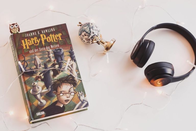 a book and sunglasses