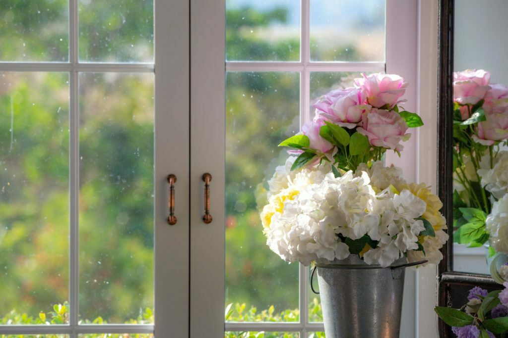 a vase with white flowers
