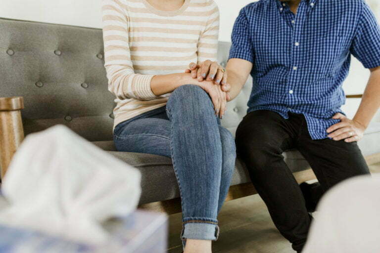 a man sitting on a couch