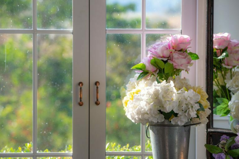 a vase with white flowers